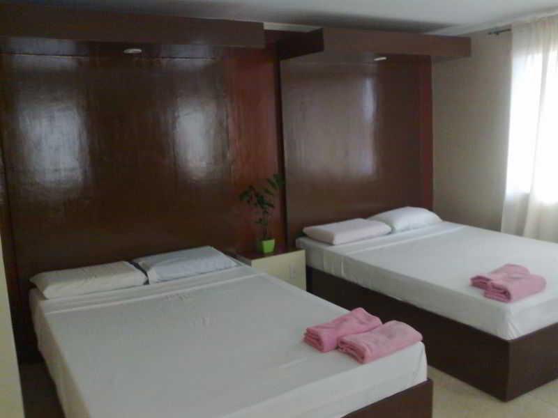 Queen\'S Beach Resort Manoc-Manoc Exterior photo