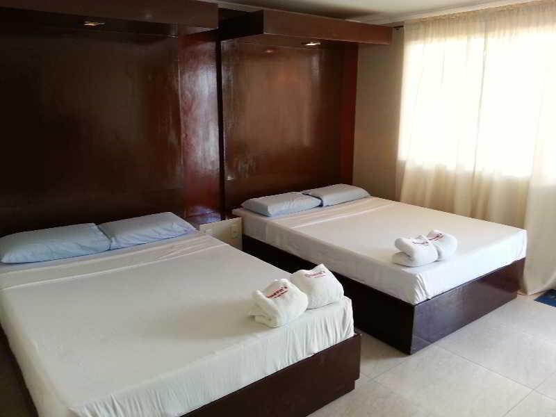 Queen\'S Beach Resort Manoc-Manoc Exterior photo
